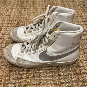 NIKE blazers with silver symbol